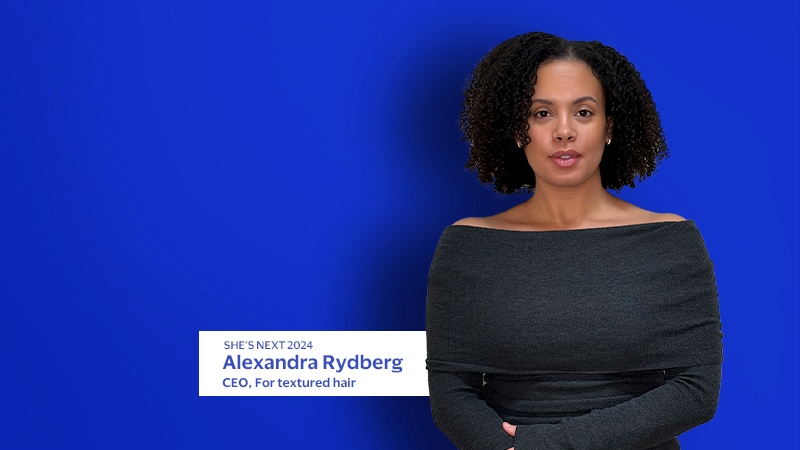 Alexandra Rydberg in front of blue background