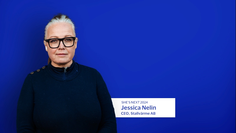 Jessica Nelin in front of blue background