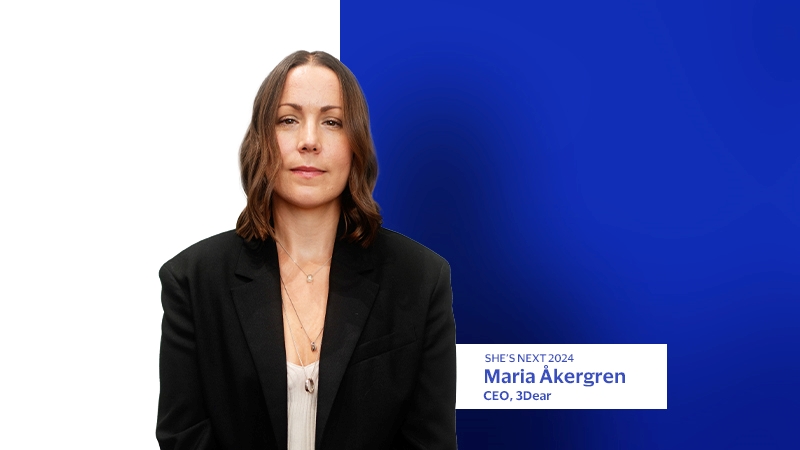 Maria Akergren in front of blue background